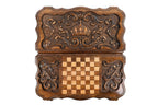 Front cover with the crown and scrolls above the back cover with the chequerboard, seen from above