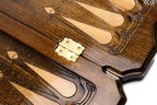 Brass hinge on the centre bar of the open board with pale and dark points either side