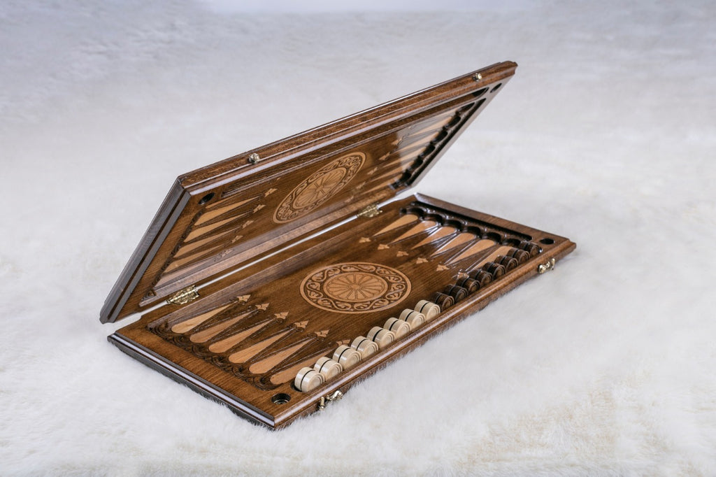 Armenian backgammon set opening, carved points and a petal wheel inside, checkers in the trays