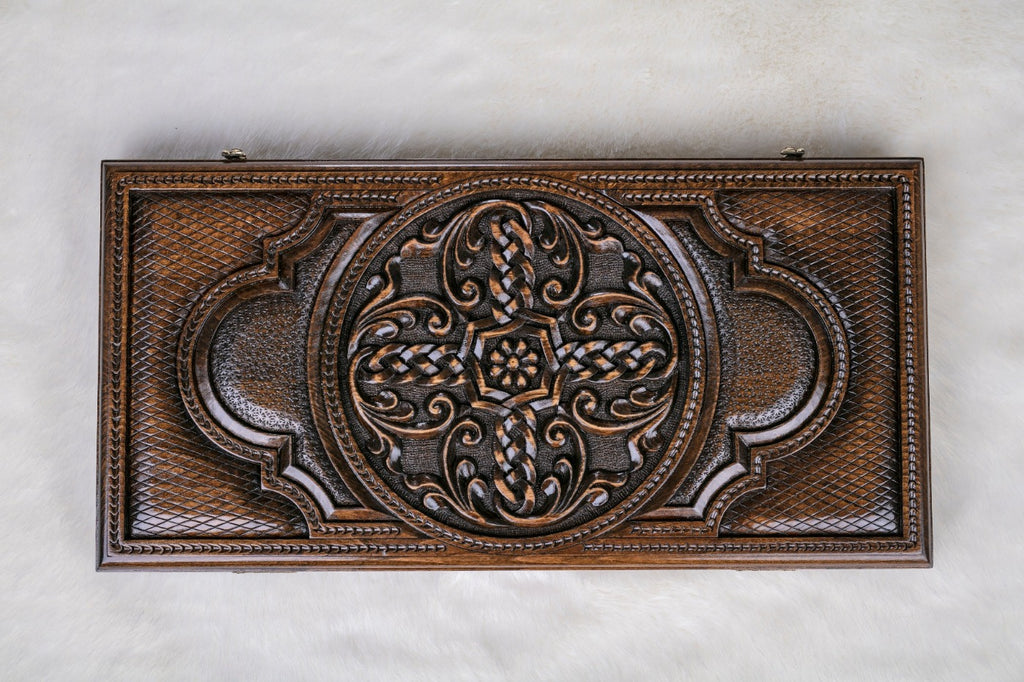Top view of the closed board: braided cross medallion, fine lattice and lobed cartouches, 60 cm