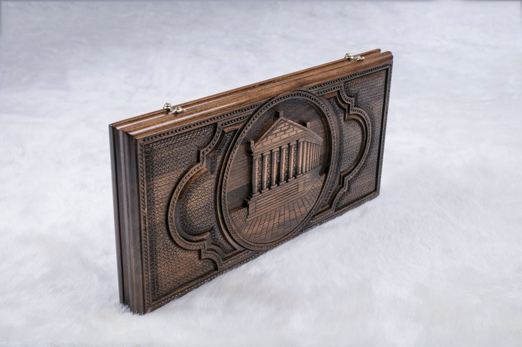Closed backgammon board on edge, Garni Temple columns and steps carved in a round frame with a rope border