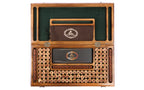 Open wooden lotto set from above with 90 numbered barrels and green felt