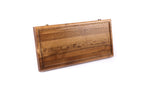 Back of the walnut lotto box with a carved lattice pattern