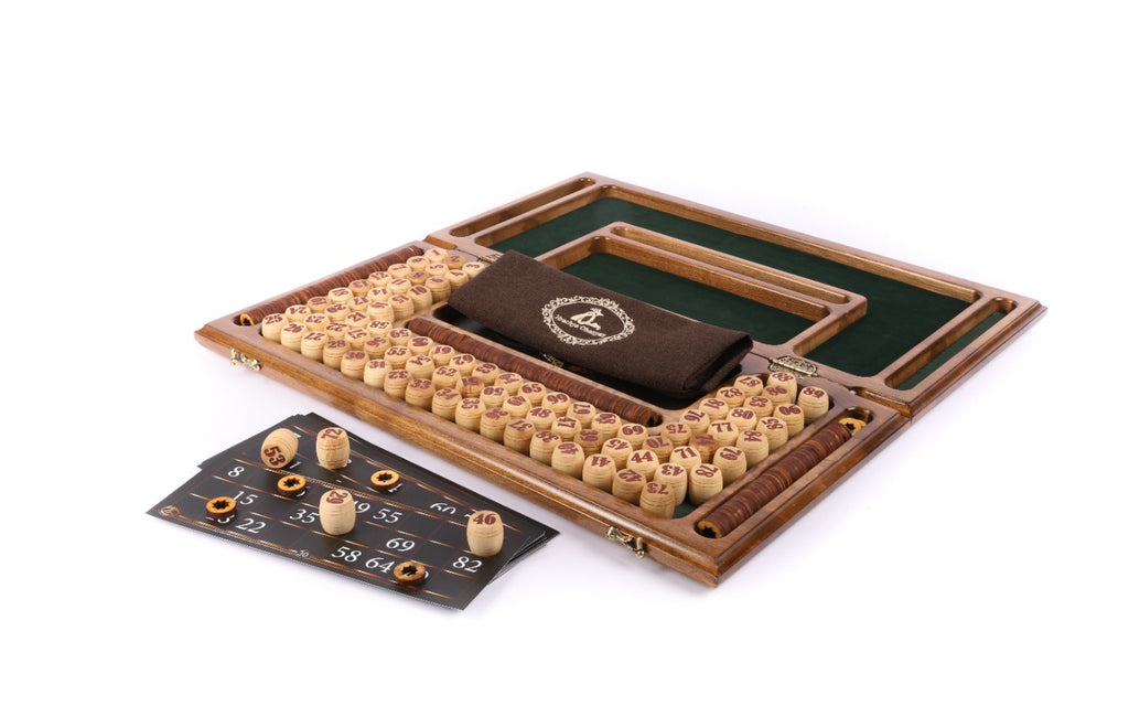 Wooden lotto set with game cards laid out in front of the open box