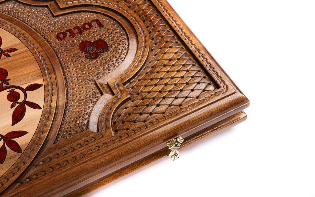 Hand-carved lattice and Lotto lettering on the walnut lid