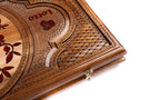 Hand-carved lattice and Lotto lettering on the walnut lid
