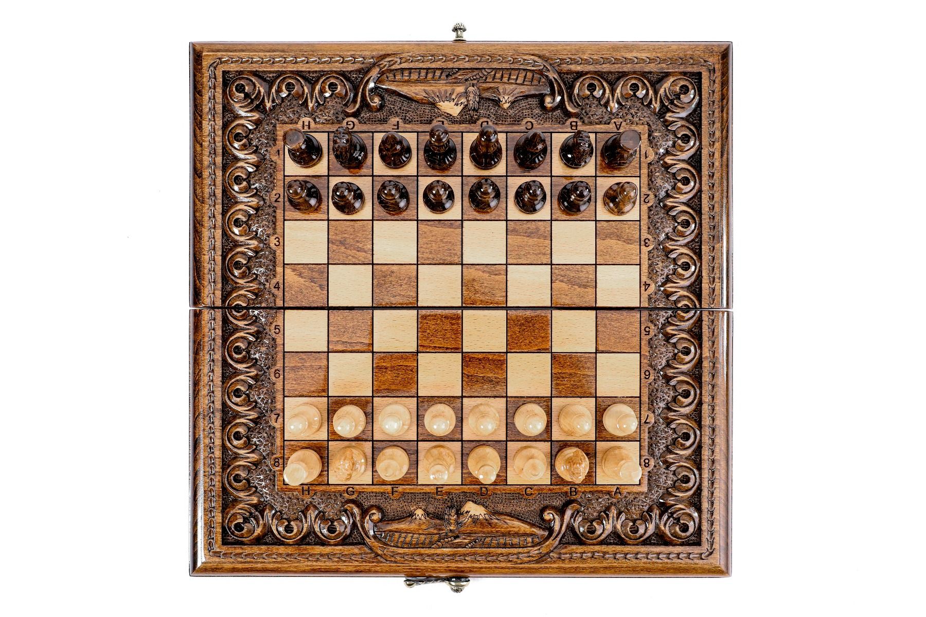 Compact handcrafted chess set with Armenian motif and integrated backgammon board