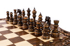 Side profile of the ornately carved chess table