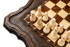 Carved cabriole legs of the wooden chess table
