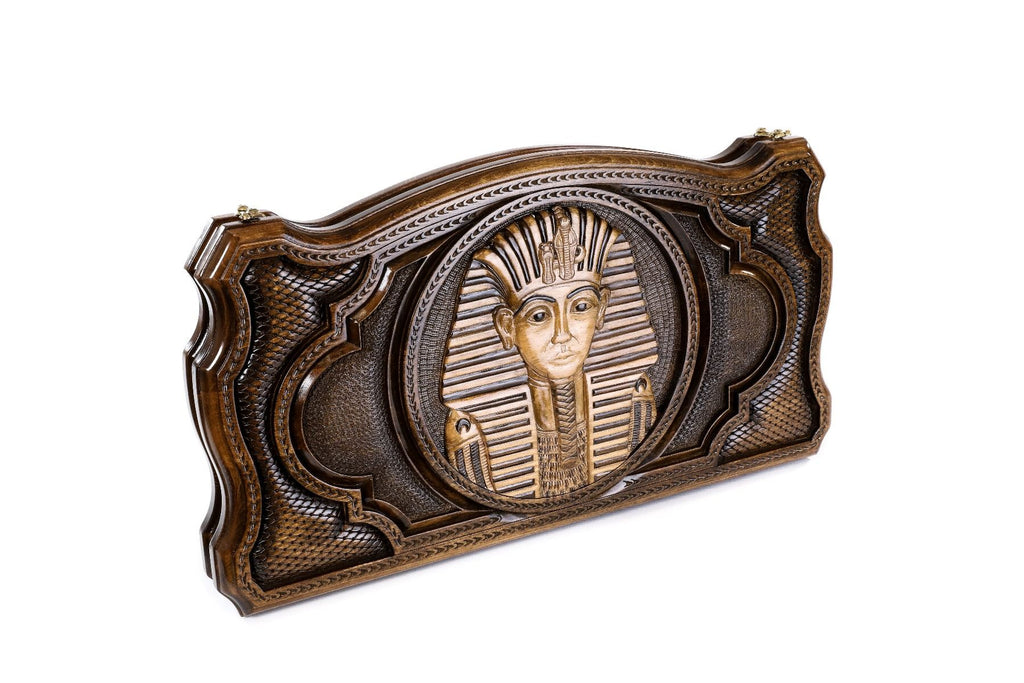 A close-up of the hand-carved Egyptian regalia, showcasing the extreme precision and depth of the solid wood craftsmanship.