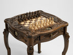 Handcrafted wooden chess table with carved lion heads on the legs
