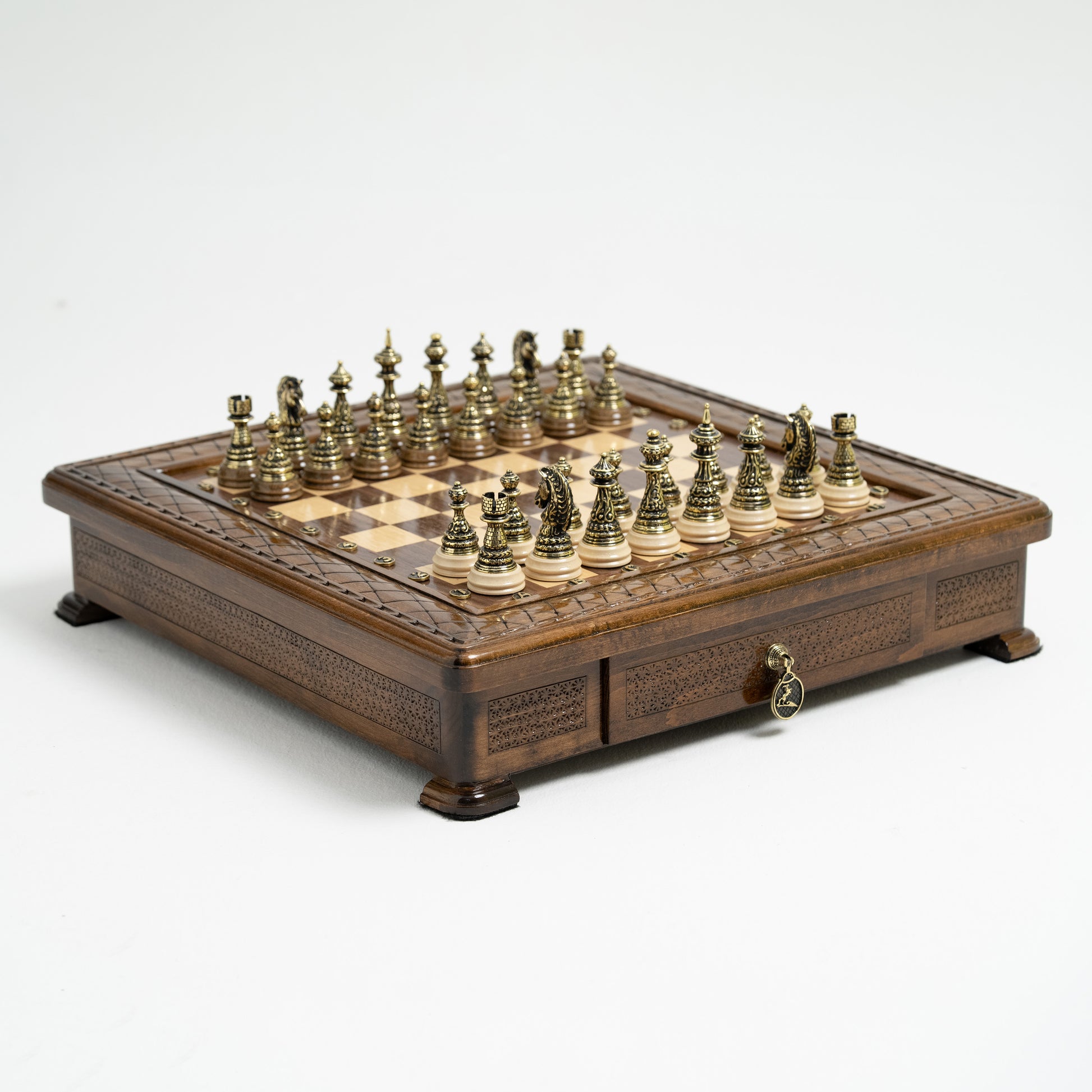 Handmade wooden chess set with integrated storage, open to show premium bronze chess pieces.