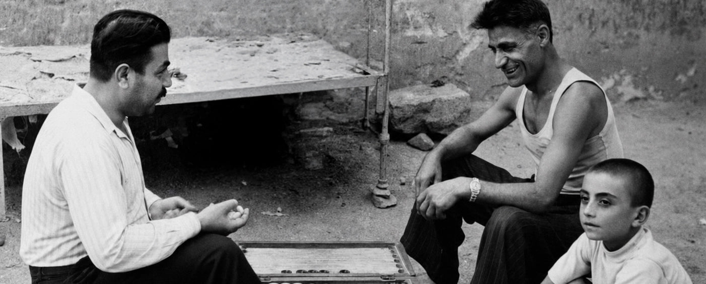 Men playing backgammon in a courtyard in Yerevan, 1959