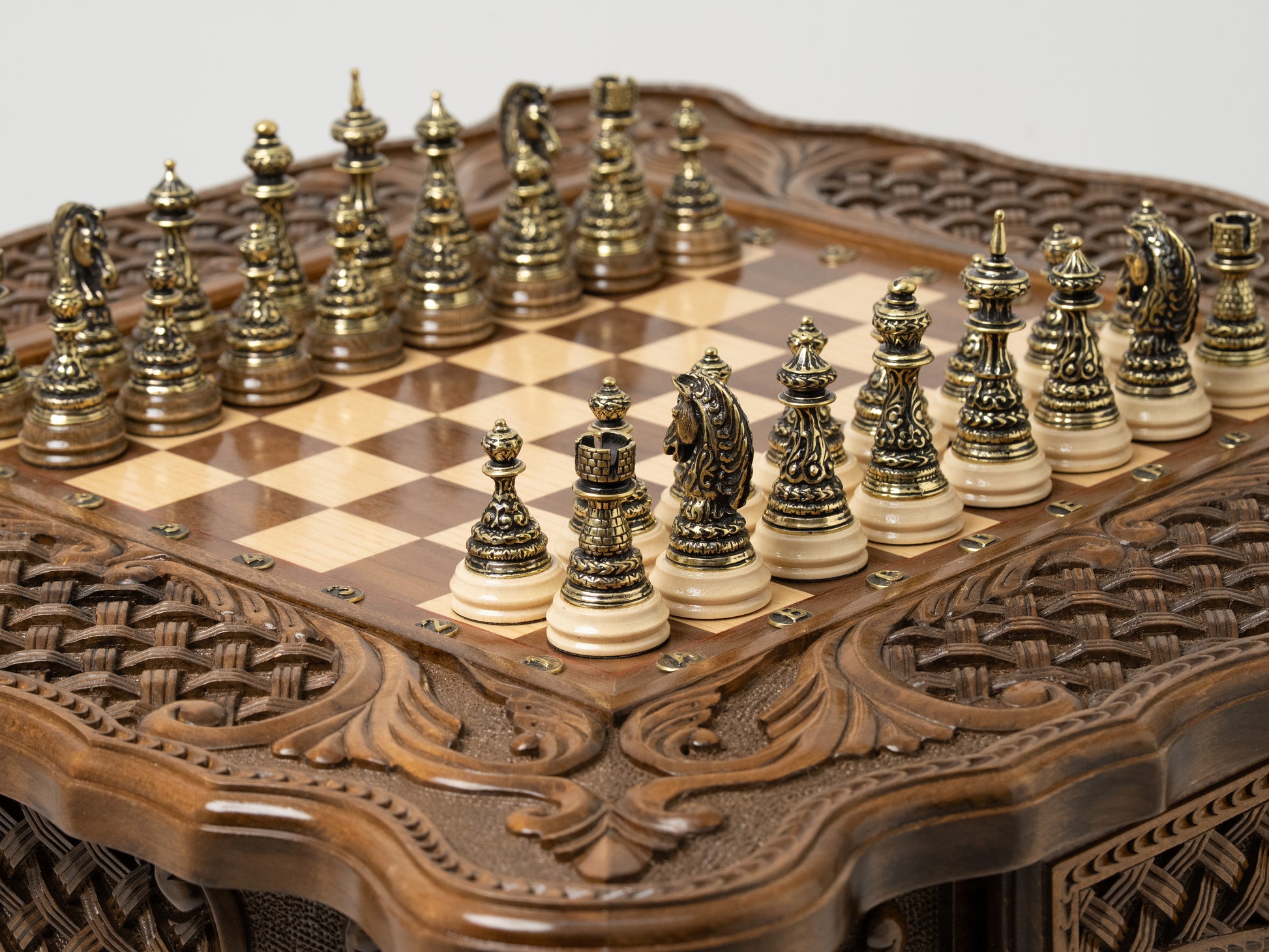 Artistic chess table setup with unique handcrafted details