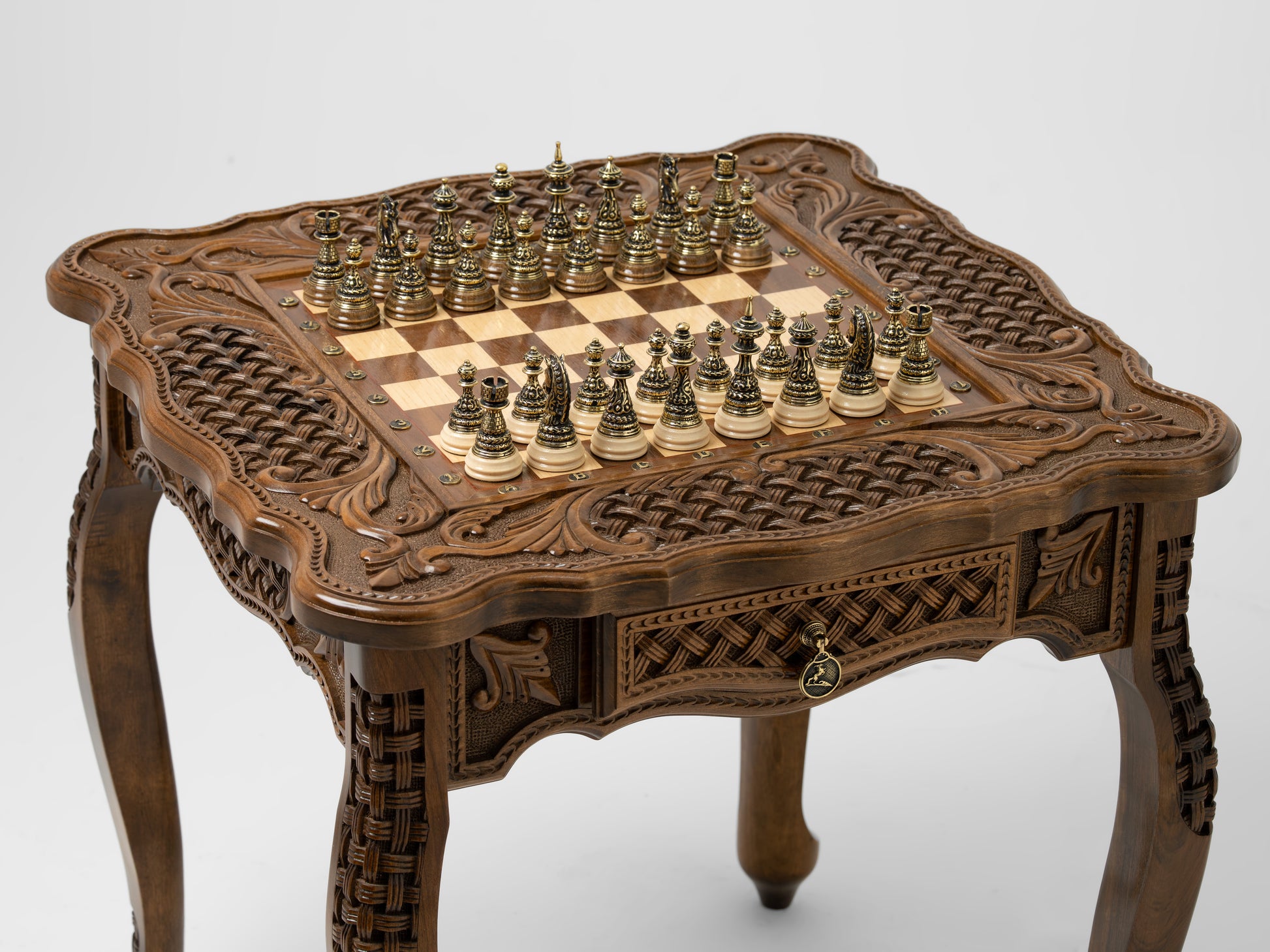 Close-up of inlaid chess board on elegant wooden table